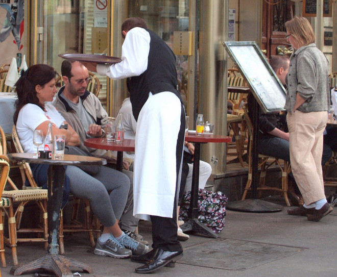 Diners Reading Menu